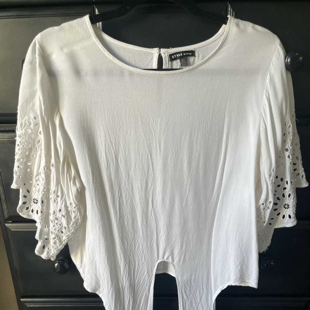 White blouse with flowy sleeves